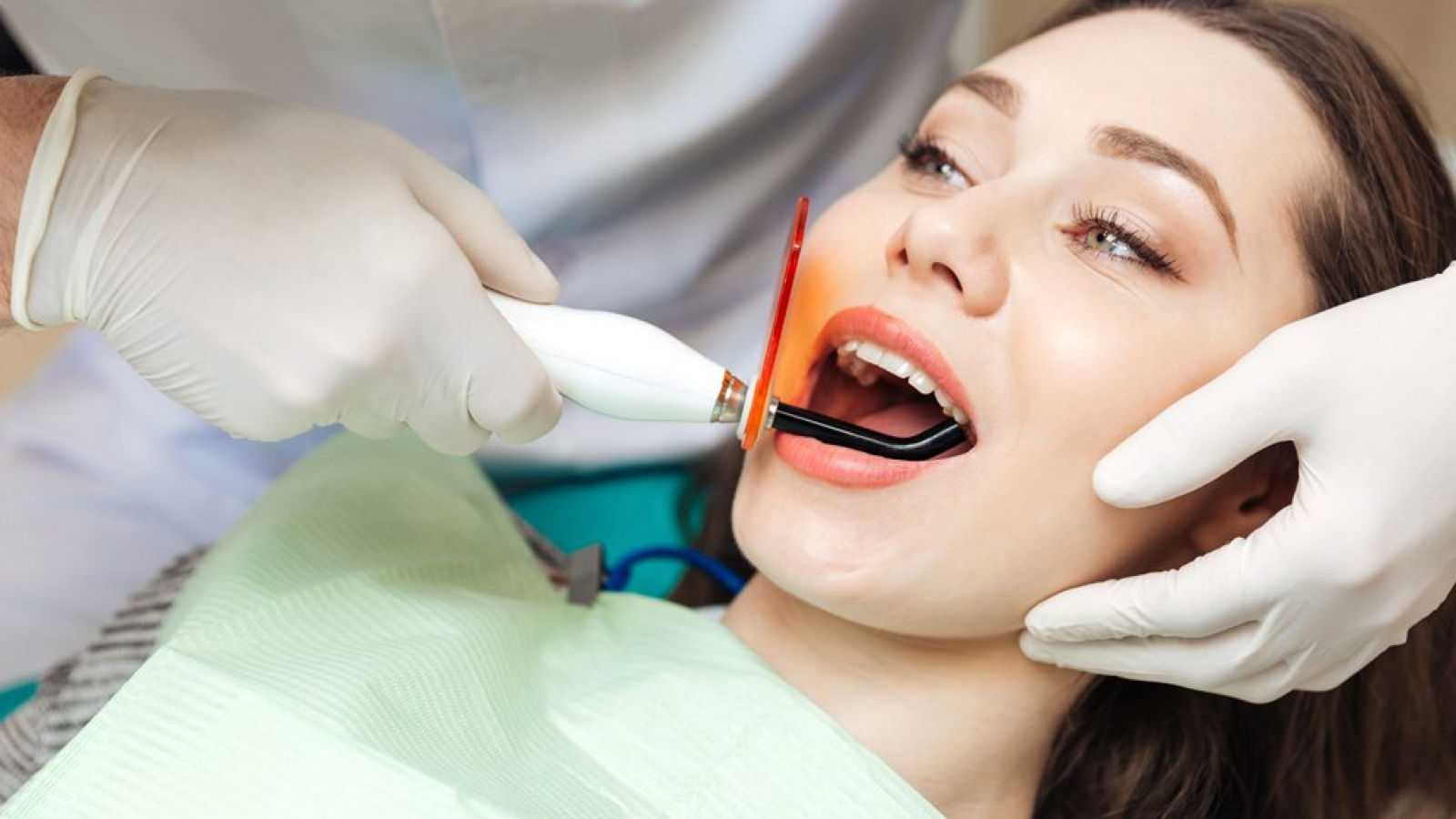 close-up-portrait-of-a-girl-getting-her-teeth-PVTMTVA